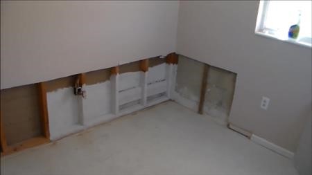 bathroom floor repair water damage Holly Springs NC